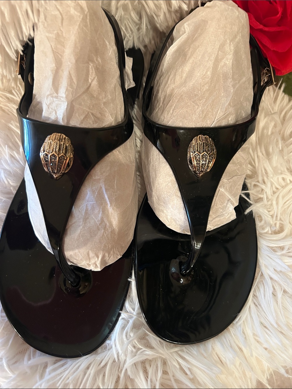 Kurt Geiger Black Patent T‑Strap Sandals with Gold Emblem